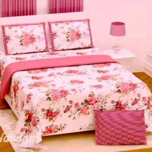 Shades of pastel peachish pink and off white floral print on double bedsheet